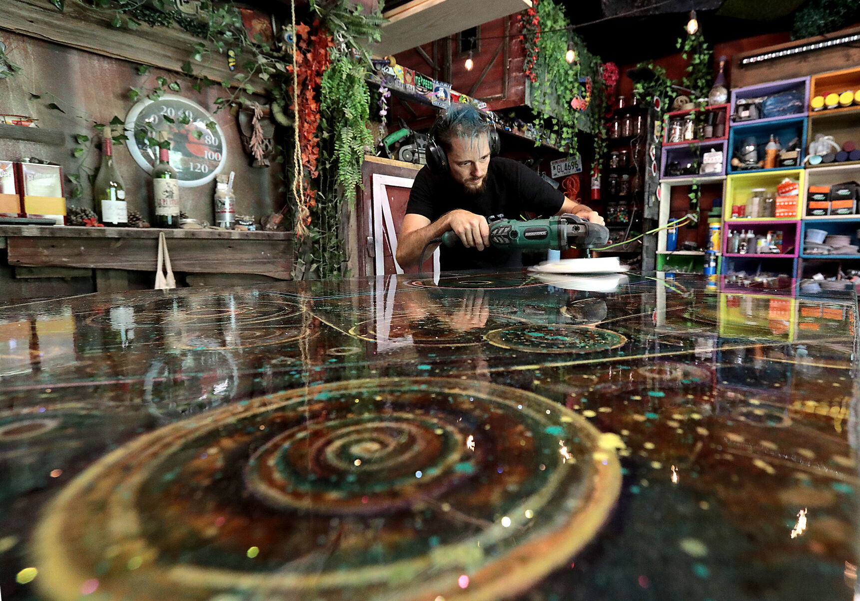 Nick Ringelstetter Buffing Resin Coated Artwork